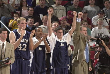 SEATTLE - MARCH 20:  Members of the Nevada Wolf Pack celebrate during the second round game of the NCAA Division I Men's Basketball Tournament against the Gonzaga Bulldogs on March 20, 2004 at Key Arena in Seattle, Washington.  (Photo by Otto Greule Jr/Getty Images)