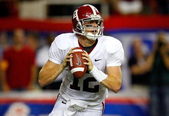 ATLANTA - SEPTEMBER 05:  Quarterback Greg McElroy #12 of the Alabama Crimson Tide looks upfield against the Virginia Tech Hokies during the Chick-fil-A Kickoff Game at Georgia Dome on September 5, 2009 in Atlanta, Georgia.  (Photo by Kevin C. Cox/Getty Images)