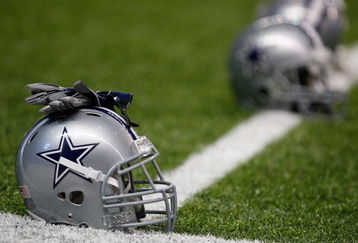 SAN ANTONIO - AUGUST 06:  Helmets of the Dallas Cowboys during training camp at the Alamodome on August 6, 2009 in San Antonio, Texas.  (Photo by Ronald Martinez/Getty Images)
