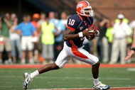 CHAMPAIGN, IL - OCTOBER 06:  Quarterback Eddie McGee #10 of the Illinois Fighting Illini runs out of the pocket against the Wisconsin Badgers October 6, 2007 at Memorial Stadium in Champaign, Illinois.  (Photo by Matthew Stockman/Getty Images)