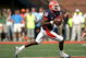 CHAMPAIGN, IL - OCTOBER 06:  Quarterback Eddie McGee #10 of the Illinois Fighting Illini runs out of the pocket against the Wisconsin Badgers October 6, 2007 at Memorial Stadium in Champaign, Illinois.  (Photo by Matthew Stockman/Getty Images)