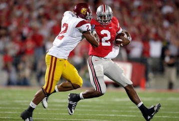 COLUMBUS, OH - SEPTEMBER 12:  Terrelle Pryor #2 of the Ohio State Buckeyes runs with the ball while defended by Taylor Mays #2 of the USC Trojans at Ohio Stadium on September 12, 2009 in Columbus, Ohio.  (Photo by Andy Lyons/Getty Images)