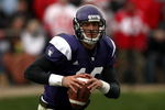 EVANSTON, IL - NOVEMBER 08:  Quarterback Mike Kafka #13 of the Northwestern Wildcats runs against of the Ohio State Buckeyes at Ryan Stadium on November 8, 2008 in Evanston, Illinois  (Photo by Jonathan Ferrey/Getty Images)