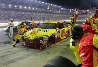 HAMPTON, GA - SEPTEMBER 06:  Kevin Harvick, driver of the #29 Shell / Pennzoil Chevrolet makes a pit stop during the NASCAR Sprint Cup Series Pep Boys Auto 500 at Atlanta Motor Speedway on September 6, 2009 in Hampton, Georgia.  (Photo by Jerry Markland/Getty Images for NASCAR)