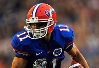 GAINESVILLE, FL - SEPTEMBER 5:  Riley Cooper #11 of the Florida Gators runs for a touchdown during the game against the Charleston Southern Buccaneers at Ben Hill Griffin Stadium on September 5, 2009 in Gainesville, Florida.  (Photo by Sam Greenwood/Getty Images)