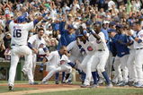 CHICAGO - JUNE 29: Aramis Ramirez #16 of the Chicago Cubs run to home plate where he is greeted by teammates after Ramirez hit a two-run, walk-off home run to beat the Milwaukee Brewers at Wrigley Field June 29, 2007 in Chicago, Illinois. The Cubs defeated the Brewers 6-5. (Photo by Jonathan Daniel/Getty Images) 