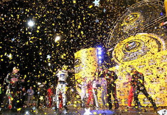 RICHMOND, VA - SEPTEMBER 12: Confetti flies as drivers celebrate after making the Chase for the NASCAR Sprint Cup Championship  after the NASCAR Sprint Cup Series Chevy Rock & Roll 400 at Richmond International Raceway on September 12, 2009 in Richmond, Virginia.  (Photo by Jerry Markland/Getty Images for NASCAR)