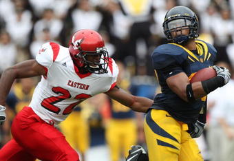BERKELEY, CA - SEPTEMBER 12: Mychal Kendricks #30 of the California Golden Bears returns a fumble for 45 yards against Taiwan Jones #22 of the Eastern Washington Eagles at Memorial Stadium on September 12, 2009 in Berkeley, California. (Photo by Jed Jacobsohn/Getty Images)