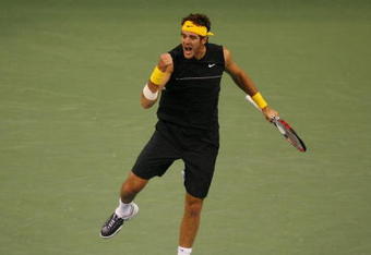 NEW YORK - SEPTEMBER 10:  Juan Martin Del Potro of Argentina celebrates match point during the Men's Singles Quarterfinals match against Marin Cilic of Croatia during day eleven of the 2009 U.S. Open at the USTA Billie Jean King National Tennis Center on September 10, 2009 in the Flushing neighborhood of the Queens borough of New York City.  Del Potro defeated Cilic 4-6, 6-3, 6-2, 6-1.  (Photo by Matthew Stockman/Getty Images)