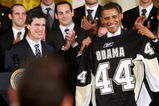 WASHINGTON - SEPTEMBER 10:  U.S. President Barack Obama (R) is presented with a jersey from captain Sidney Crosby (L) of Pittsburgh Penguins during an East Room event September 10, 2009 at the White House in Washington, DC. Obama hosted the Penguins to honor their 2009 Stanley Cup championship victory.  (Photo by Alex Wong/Getty Images)