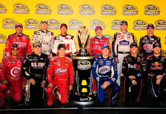 RICHMOND, VA - SEPTEMBER 12:  (Back row from L-R) Tony Stewart, driver of the #14 Office Depot Chevrolet, Carl Edwards, driver of the #99 Aflac Ford, Greg Biffle, driver of the #16 3M Ford, Mark Martin, driver of the #5 Kellogg's Chevrolet, Jimmie Johnson, driver of the #48 Lowe's Chevrolet, Jeff Gordon, driver of the #24 Dupont Chevrolet, (Front row L-R) Juan Pablo Montoya, driver of the #42 Target Chevrolet, Ryan Newman, driver of the #39 U.S. Army Chevrolet, Kasey Kahne, driver of the #9 Budweiser Dodge, Kurt Busch, driver of the #2 Miller Lite Dodge, Denny Hamlin, driver of the #11 FedEx Toyota, and Brian Vickers, driver of the #83 Red Bull Toyota, pose with the Sprint Cup trophy following the NASCAR Sprint Cup Series Chevy Rock & Roll 400 at Richmond International Raceway on September 12, 2009 in Richmond, Virginia.  (Photo by Rusty Jarrett/Getty Images for NASCAR)