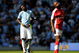 MANCHESTER, ENGLAND - SEPTEMBER 12:  Emmanuel Adebayor of Manchester and William Gallas of Arsenal prepare for the Barclays Premier League match between Manchester City and Arsenal at the City of Manchester Stadium on September 12, 2009 in Manchester, England.  (Photo by Shaun Botterill/Getty Images)