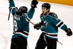 SAN JOSE, CA - MAY 02:  Jonathan Cheechoo #14 of the San Jose Sharks celebrates with teammate Milan Michalek #9 after Michalek scored a third period goal against the Dallas Stars during game five of the Western Conference Semifinals of the 2008 NHL Stanley Cup Playoffs at HP Pavilion on May 2, 2008 in San Jose, California.  (Photo by Christian Petersen/Getty Images)