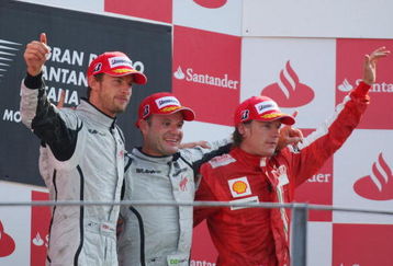 MONZA, ITALY - SEPTEMBER 13:  Race winner Rubens Barrichello (C) of Brazil and Brawn GP celebrates with second placed team mate Jenson Button (L) of Great Britain and Brawn GP and third placed Kimi Raikkonen (R) of Finland and Ferrari on the podium following the Italian Formula One Grand Prix at the Autodromo Nazionale di Monza on September 13, 2009 in Monza, Italy.  (Photo by Mark Thompson/Getty Images)
