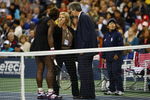 NEW YORK - SEPTEMBER 12:  Serena Williams (L) argues with Brian Early (R) and Donna Kelso (C) after disqualified for a default during the Women's Singles Semifinal match against to Kim Clijsters of Belgium on day thirteen of the 2009 U.S. Open at the USTA Billie Jean King National Tennis Center on September 12, 2009 in the Flushing neighborhood of the Queens borough of New York City.  (Photo by Julian Finney/Getty Images)
