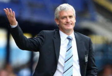 PORTSMOUTH, ENGLAND - AUGUST 30:  Mark Hughes, manager of Manchester City during the Barclays Premier League match between Portsmouth and Manchester City at Fratton Park on August 30, 2009 in Portsmouth, England.  (Photo by Phil Cole/Getty Images)