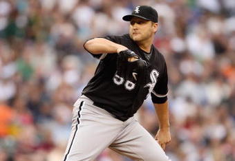 SEATTLE - AUGUST 12:  Mark Buehrle #56 of the Chicago White Sox pitches during the game against the Seattle Mariners on August 12, 2009 at Safeco Field in Seattle, Washington. (Photo by Otto Greule Jr/Getty Images) 
