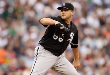 SEATTLE - AUGUST 12:  Mark Buehrle #56 of the Chicago White Sox pitches during the game against the Seattle Mariners on August 12, 2009 at Safeco Field in Seattle, Washington. (Photo by Otto Greule Jr/Getty Images) 