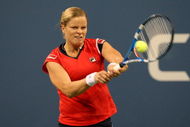NEW YORK - SEPTEMBER 12:  Kim Clijsters of Belgium returns a shot to Serena Williams during the Women's Singles Semifinal match on day thirteen of the 2009 U.S. Open at the USTA Billie Jean King National Tennis Center on September 12, 2009 in the Flushing neighborhood of the Queens borough of New York City.  (Photo by Jim McIsaac/Getty Images)
