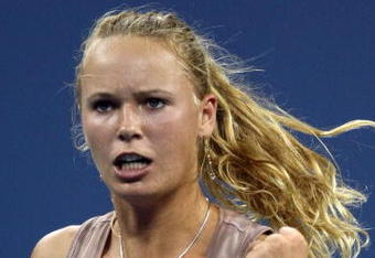 NEW YORK - SEPTEMBER 09:  Caroline Wozniacki of Denmark reacts to a point against Melanie Oudin of the United States during day ten of the 2009 U.S. Open at the USTA Billie Jean King National Tennis Center on September 9, 2009 in the Flushing neighborhood of the Queens borough of New York City.  (Photo by Nick Laham/Getty Images)