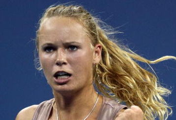 NEW YORK - SEPTEMBER 09:  Caroline Wozniacki of Denmark reacts to a point against Melanie Oudin of the United States during day ten of the 2009 U.S. Open at the USTA Billie Jean King National Tennis Center on September 9, 2009 in the Flushing neighborhood of the Queens borough of New York City.  (Photo by Nick Laham/Getty Images)