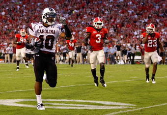 ATHENS, GA - SEPTEMBER 12:  Tailback Brian Maddox #10 of the South Carolina Gamecocks rushes in a touchdown against the Georgia Bulldogs at Sanford Stadium on September 12, 2009 in Athens, Georgia.  (Photo by Kevin C. Cox/Getty Images)