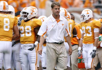 KNOXVILLE, TN - SEPTEMBER 12: Lane Kiffin, head coach of the Tennessee Volunteers looks on before a game against the UCLA Bruins on September 12, 2009 at Neyland Stadium in Knoxville, Tennessee. (Photo by Joe Murphy/Getty Images)