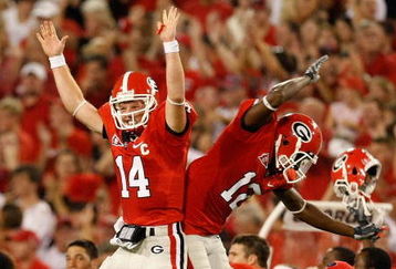 ATHENS, GA - SEPTEMBER 12:  Quarterback Joe Cox #14 and Tavarres King #12 celebrate a touchdown against the Georgia Bulldogs of the South Carolina Gamecocks at Sanford Stadium on September 12, 2009 in Athens, Georgia.  (Photo by Kevin C. Cox/Getty Images)