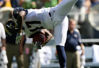 SEATTLE - SEPTEMBER 13:  Wide receiver Donnie Avery #17 of the St. Louis Rams goes airborne as he is tackled during the game against the Seattle Seahawks on September 13, 2009 at Qwest Field in Seattle, Washington. The Seahawks defeated the Rams 28-0. (Photo by Otto Greule Jr/Getty Images)