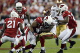 GLENDALE, AZ - NOVEMBER 10:  Josh Morgan #84 of the San Francisco 49ers takes a hit from Karlos Dansby #58 the Arizona Cardinals during the game at University of Phoenix Stadium on November, 10 2008 in Glendale, Arizona.  (Photo by Harry How/Getty Images)