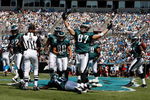 CHARLOTTE, NC - SEPTEMBER 13:  Members of the Philadelphia Eagles celebrate in the endzone after a touchdown by tight end Brent Celek #87, in the first half of the NFL season opener against the Carolina Panthers at Bank of America Stadium on September 13, 2009 in Charlotte, North Carolina.  (Photo by Streeter Lecka/Getty Images)