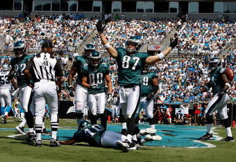 CHARLOTTE, NC - SEPTEMBER 13:  Members of the Philadelphia Eagles celebrate in the endzone after a touchdown by tight end Brent Celek #87, in the first half of the NFL season opener against the Carolina Panthers at Bank of America Stadium on September 13, 2009 in Charlotte, North Carolina.  (Photo by Streeter Lecka/Getty Images)
