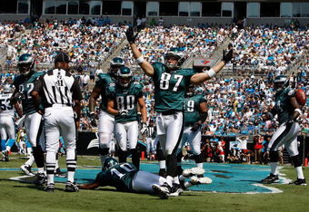 CHARLOTTE, NC - SEPTEMBER 13:  Members of the Philadelphia Eagles celebrate in the endzone after a touchdown by tight end Brent Celek #87, in the first half of the NFL season opener against the Carolina Panthers at Bank of America Stadium on September 13, 2009 in Charlotte, North Carolina.  (Photo by Streeter Lecka/Getty Images)
