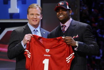 NEW YORK - APRIL 25:  NFL Commissioner Roger Goodell poses with with San Francisco 49ers #10 draft pick Michael Crabtree at Radio City Music Hall for the 2009 NFL Draft on April 25, 2009 in New York City  (Photo by Jeff Zelevansky/Getty Images)
