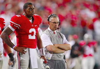 COLUMBUS, OH - SEPTEMBER 12:  Terrelle Pryor #2 and head coach Jim Tressel of the Ohio State Buckeyes look on from the sidelines during their game against the USC Trojans at Ohio Stadium on September 12, 2009 in Columbus, Ohio. (Photo by Gregory Shamus/Getty Images)