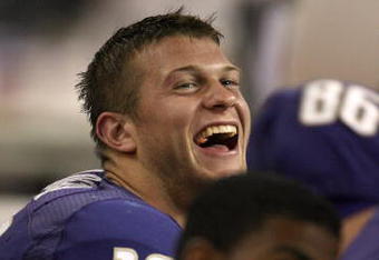 SEATTLE - SEPTEMBER 13:  Quarterback Jake Locker #10 of the Washington Huskies laughs from the bench during the game against the Oklahoma Sooners on September 13, 2008 at Husky Stadium in Seattle, Washington. The Sooners defeated the Huskies 55-14.(Photo by Otto Greule Jr/Getty Images) 