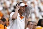 KNOXVILLE, TN - SEPTEMBER 12: Lane Kiffin, head coach of the Tennessee Volunteers yells from the sideline agianst the UCLA Bruins on September 12, 2009 at Neyland Stadium in Knoxville, Tennessee. The Bruins beat the Volunteers 19-15. (Photo by Joe Murphy/Getty Images)
