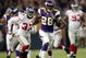 MINNEAPOLIS - DECEMBER 28:   Adrian Peterson #28 of the Minnesota Vikings runs the ball in for a touchdown as James Butler of the New York Giants defends on December 28, 2008 at the Hubert H. Humphrey Metrodome in Minneapolis, Minnesota. The Vikings defeated the Giants 20-19. (Photo by Elsa/Getty Images)