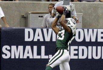 HOUSTON - SEPTEMBER 13:  Wide receiver Chansi Stuckey #83 of the New York Jets goes up for a touchdown reception in the second quarter against the Houston Texans at Reliant Stadium on September 13, 2009 in Houston, Texas.  (Photo by Bob Levey/Getty Images)