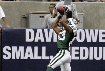 HOUSTON - SEPTEMBER 13:  Wide receiver Chansi Stuckey #83 of the New York Jets goes up for a touchdown reception in the second quarter against the Houston Texans at Reliant Stadium on September 13, 2009 in Houston, Texas.  (Photo by Bob Levey/Getty Images)