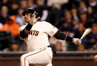 SAN FRANCISCO - AUGUST 26:  Bengie Molina #1 of the San Francisco Giants hits a pinch hit 3 run home run to give the Giants a 4-3 lead in the eighth inning of their game against the Arizona Diamondbacks at AT&T Park on August 26, 2009 in San Francisco, California.  (Photo by Ezra Shaw/Getty Images for Reebok)