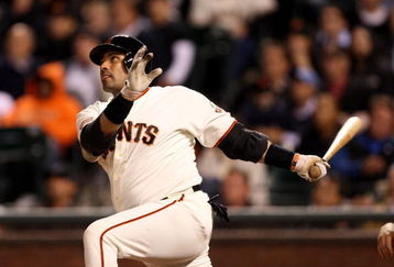 SAN FRANCISCO - AUGUST 26:  Bengie Molina #1 of the San Francisco Giants hits a pinch hit 3 run home run to give the Giants a 4-3 lead in the eighth inning of their game against the Arizona Diamondbacks at AT&T Park on August 26, 2009 in San Francisco, California.  (Photo by Ezra Shaw/Getty Images for Reebok)