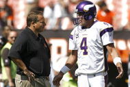 CLEVELAND - SEPTEMBER 13:  Brett Farve #4 of the Minnesota Vikings hugs Eric Mangini head coach of the Cleveland Browns talk prior to the game against the Cleveland Browns at Cleveland Browns Stadium on September 13, 2009 in Cleveland, Ohio.  (Photo by Matt Sullivan/Getty Images)