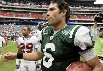 HOUSTON - SEPTEMBER 13:  Quarterback Mark Sanchez #6 of the New York Jets leaves the field with the game ball after defeating the Houston Texans 24-7 at Reliant Stadium on September 13, 2009 in Houston, Texas.  (Photo by Bob Levey/Getty Images)