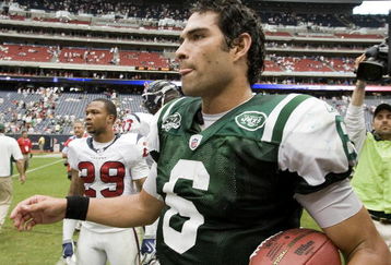 HOUSTON - SEPTEMBER 13:  Quarterback Mark Sanchez #6 of the New York Jets leaves the field with the game ball after defeating the Houston Texans 24-7 at Reliant Stadium on September 13, 2009 in Houston, Texas.  (Photo by Bob Levey/Getty Images)