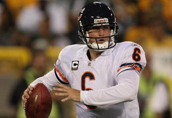 GREEN BAY, WI - SEPTEMBER 13: Jay Cutler #6 of the Chicago Bears looks for a receiver against the Green Bay Packers on September 13, 2009 at Lambeau Field in Green Bay, Wisconsin. The Packers defeated the Bears 21-15. (Photo by Jonathan Daniel/Getty Images)