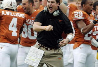 AUSTIN, TX - SEPTEMBER 5:  Defensive coordinator Will Muschamp of the Texas Longhorns gets pumped up after a turnover by the Louisiana Monroe Warhawks in the first quarter on September 5, 2009 at Darrell K Royal-Texas Memorial Stadium in Austin, Texas.  (Photo by Brian Bahr/Getty Images)