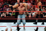 LAS VEGAS - AUGUST 24:  Wrestler John Cena picks up wrestler Randy Orton as wrestler Triple H (R) looks on during the WWE Monday Night Raw show at the Thomas & Mack Center August 24, 2009 in Las Vegas, Nevada.  (Photo by Ethan Miller/Getty Images)
