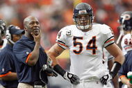 ATLANTA - OCTOBER 12:  Brian Urlacher #54 of the Chicago Bears listens to head coach Lovie Smith during the game against the Atlanta Falcons at the Georgia Dome on October 12, 2008 in Atlanta, Georgia.  (Photo by Kevin C. Cox/Getty Images)
