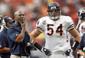 ATLANTA - OCTOBER 12:  Brian Urlacher #54 of the Chicago Bears listens to head coach Lovie Smith during the game against the Atlanta Falcons at the Georgia Dome on October 12, 2008 in Atlanta, Georgia.  (Photo by Kevin C. Cox/Getty Images)